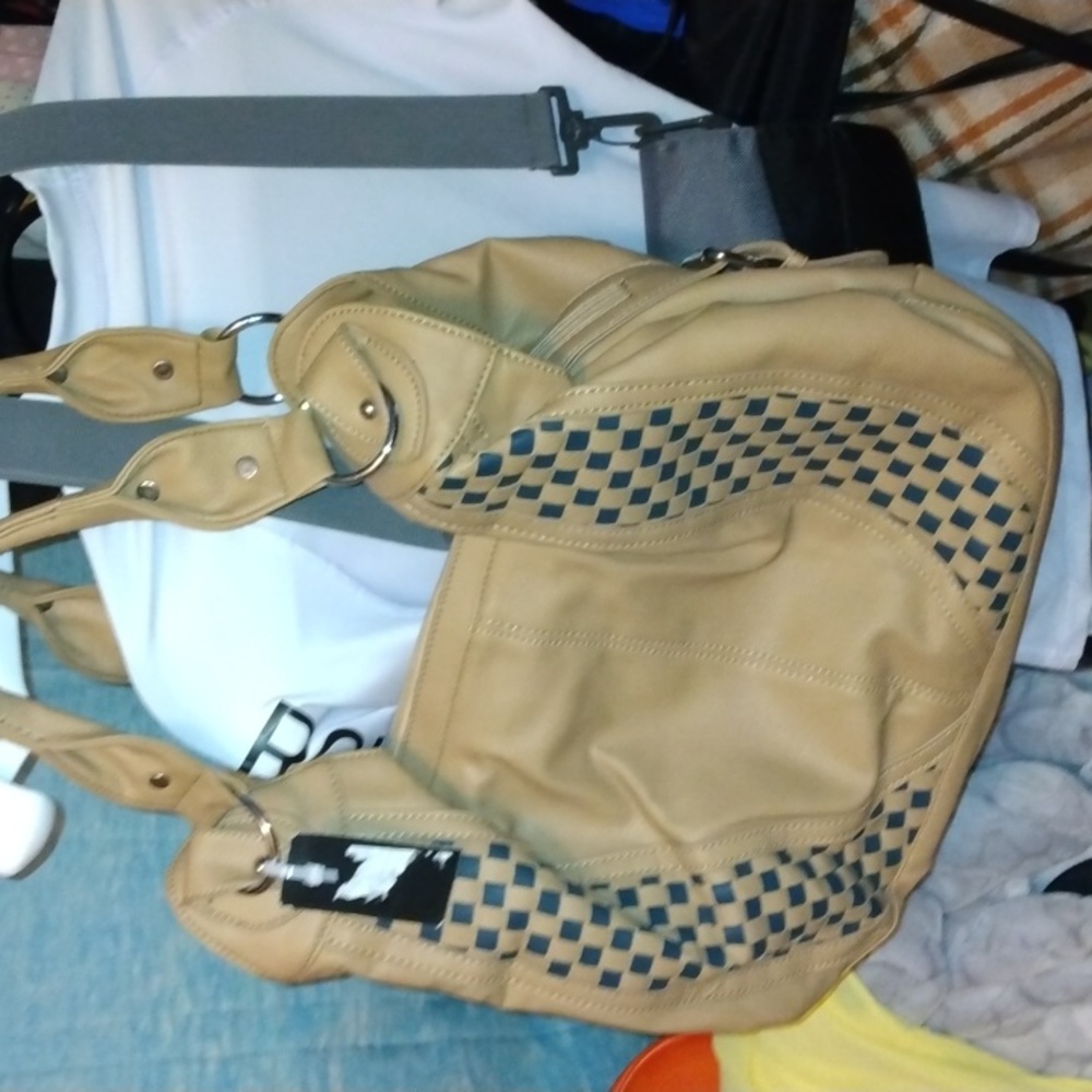Shag Wear tan and checkered black purse New